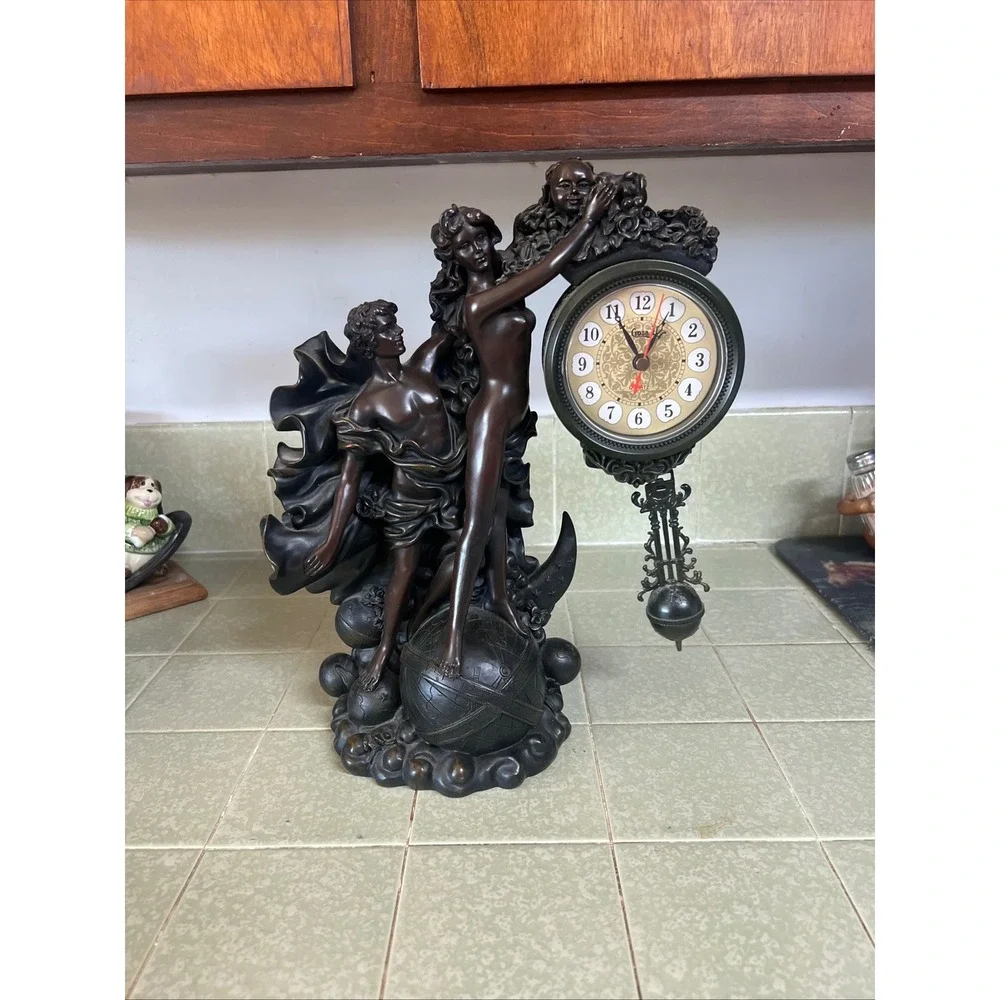 Crosa Quartz Celestial Figural Pendulum Clock Bronze Finish Man Woman Globe